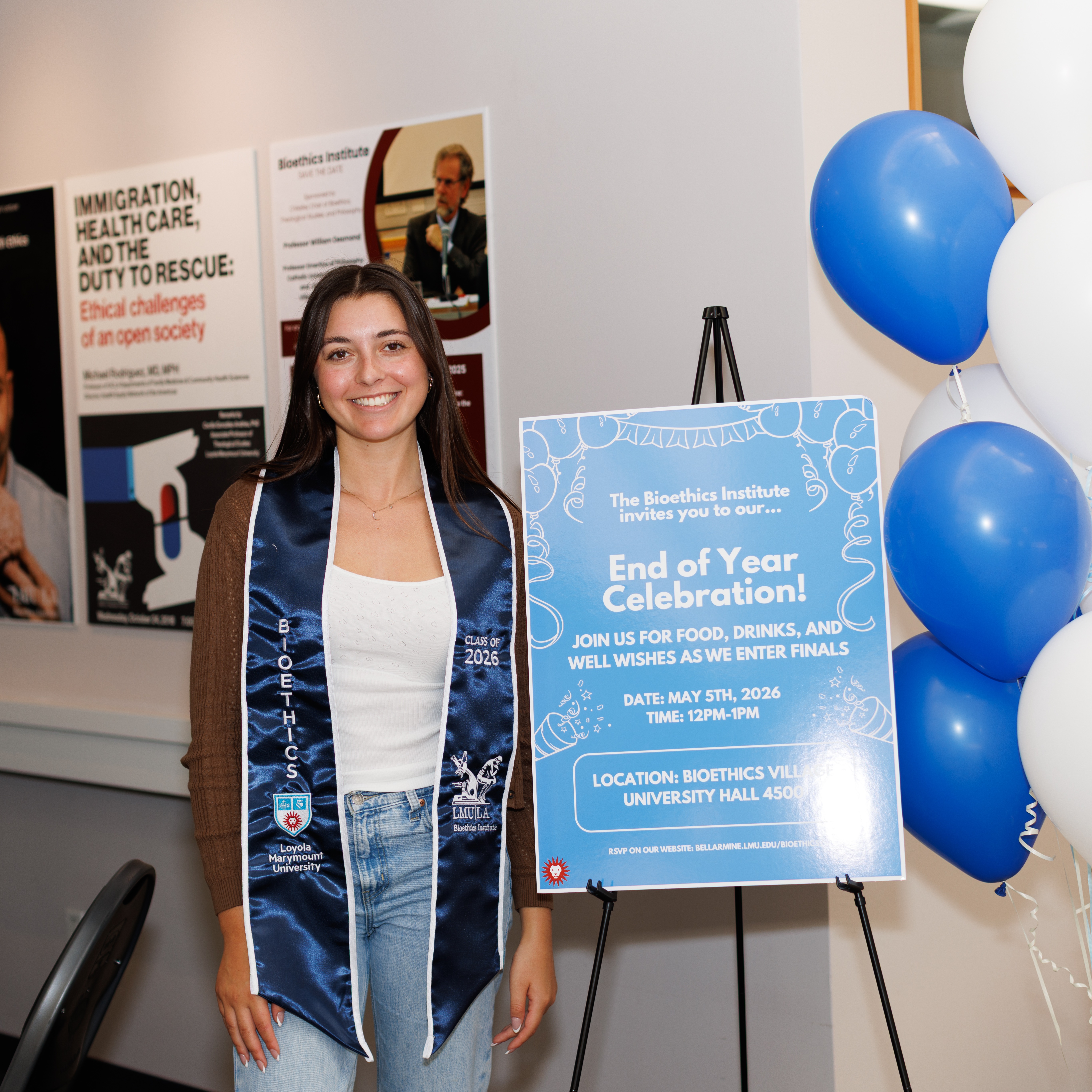 Bieothics Student Abby Nolan Posting With Stole at End of Year Celebration